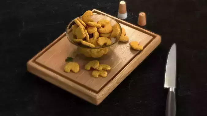 Nuggets bowl of peanuts and knife on cutting board