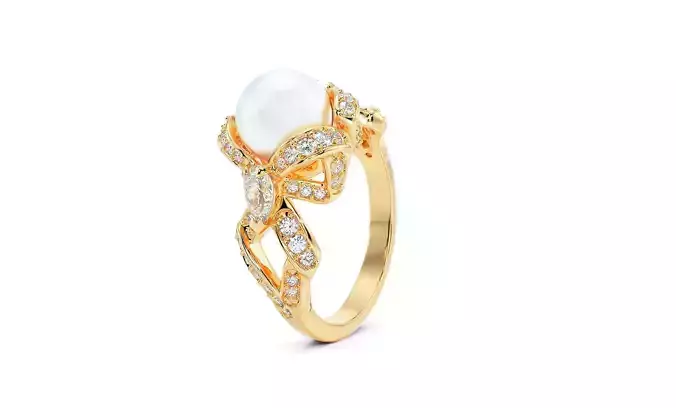 gold diamond ring with central pearl