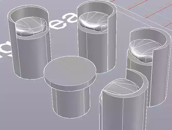 Puffie set of metal cylinders on table