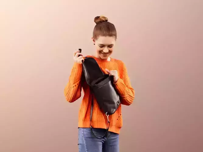 Bella 11634 - Woman In Casual Attire Opening Her Bag