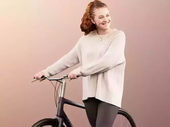 Cora 11717 - Autumn girl pushing her bike