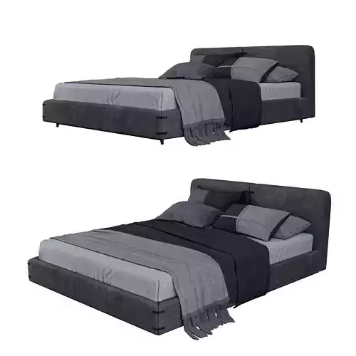 Bed N with two pillows and blanket