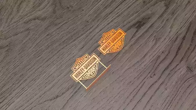 Harley Davidson logo and stand statuette