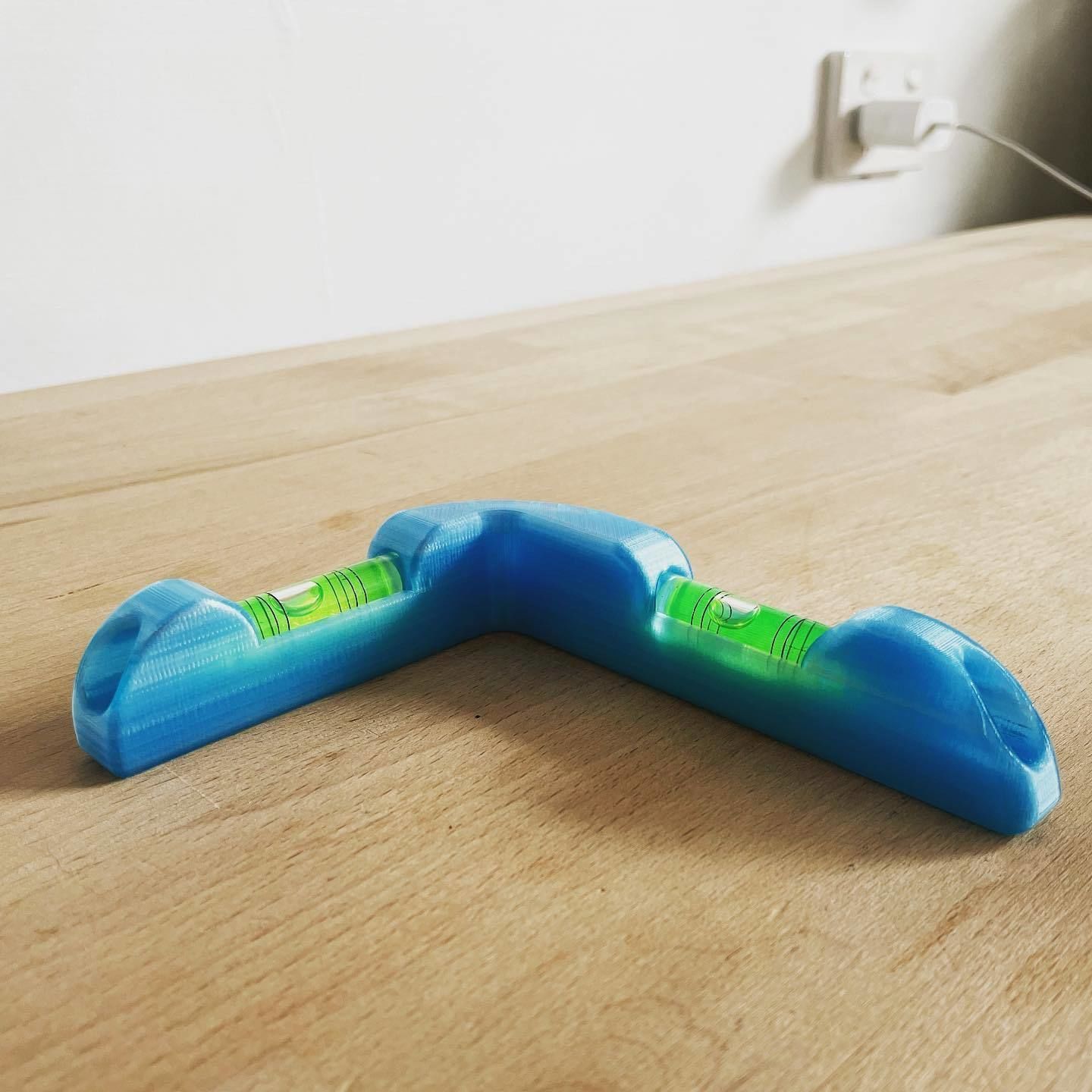 K R L level toy on wooden table 3D print model_2