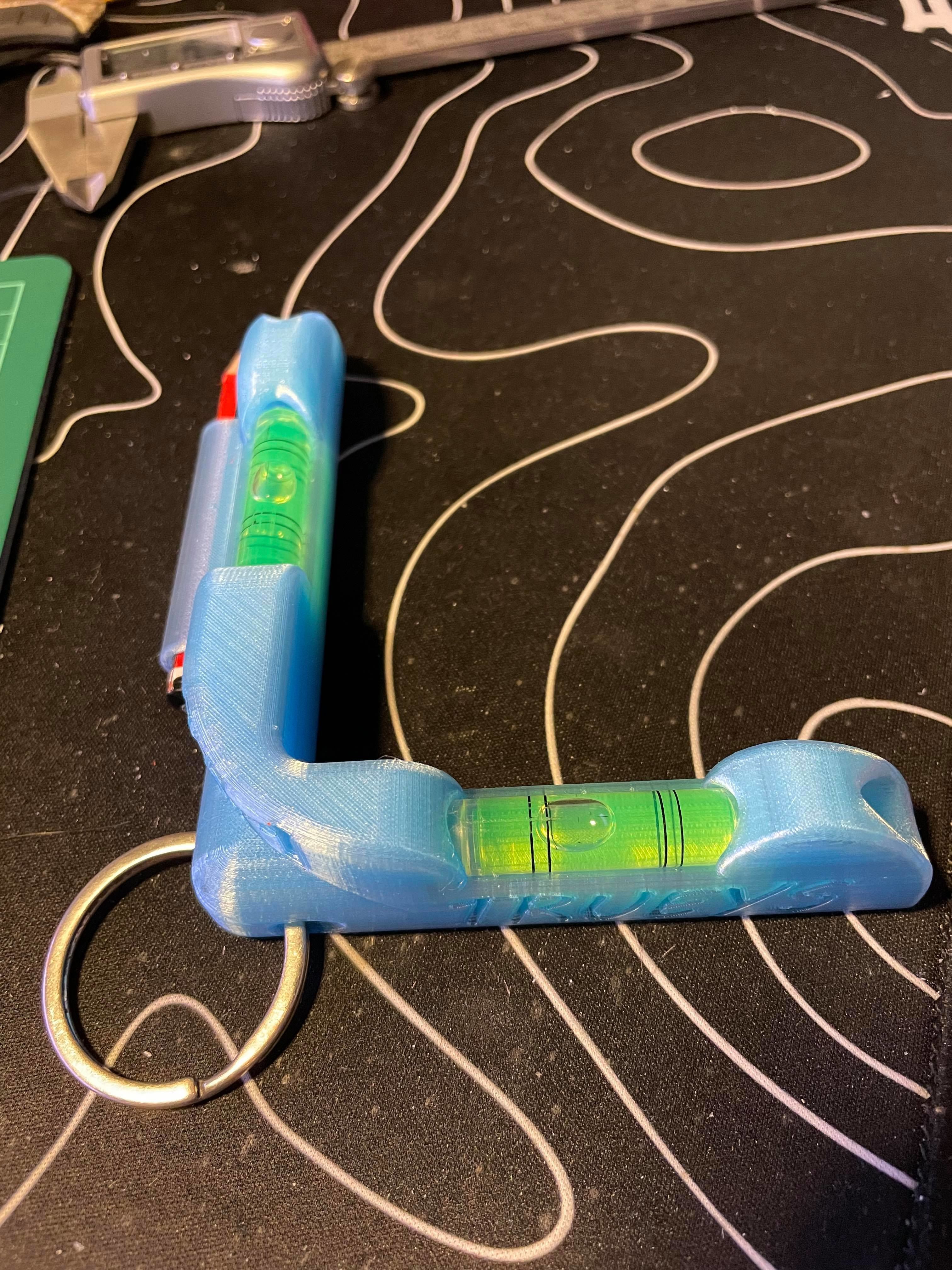 K R L level toy on wooden table 3D print model_4