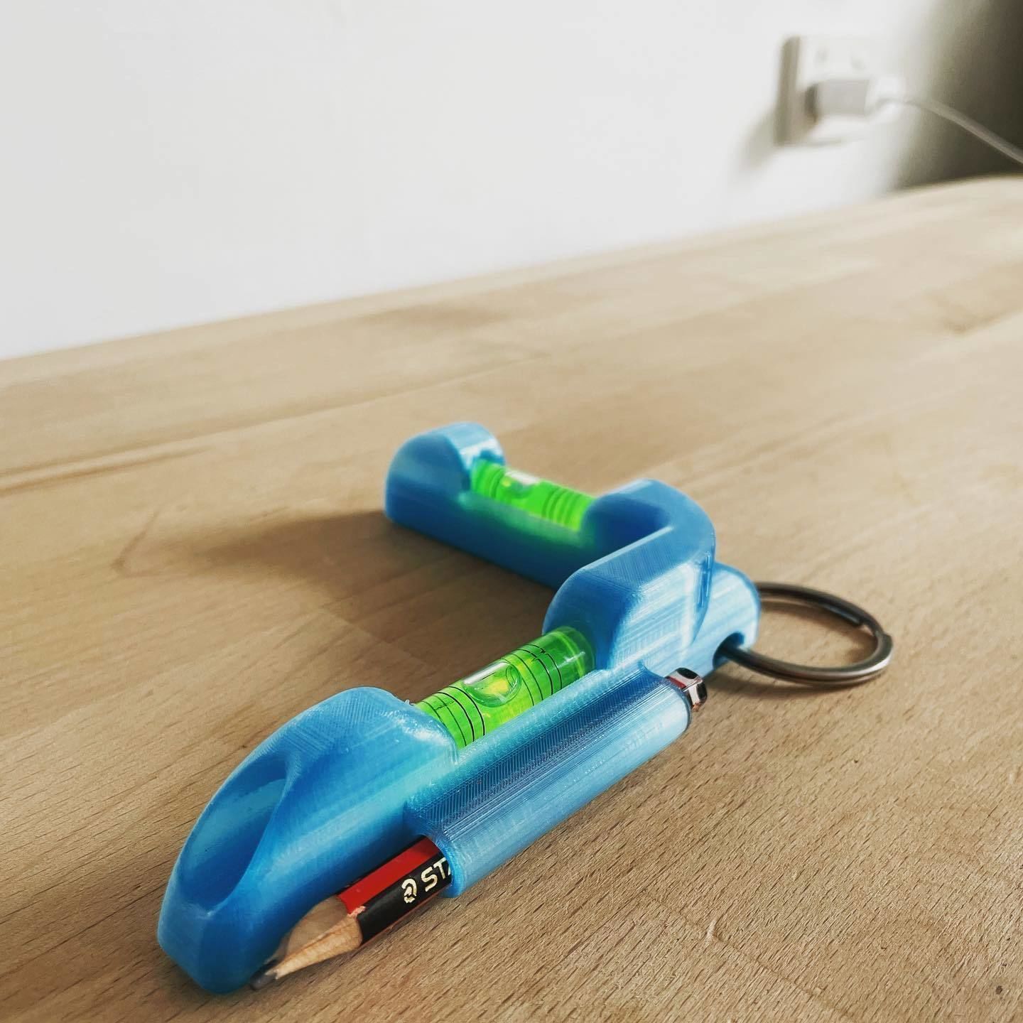 K R L level toy on wooden table 3D print model_1