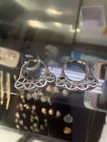 Rings person holding diamond ring