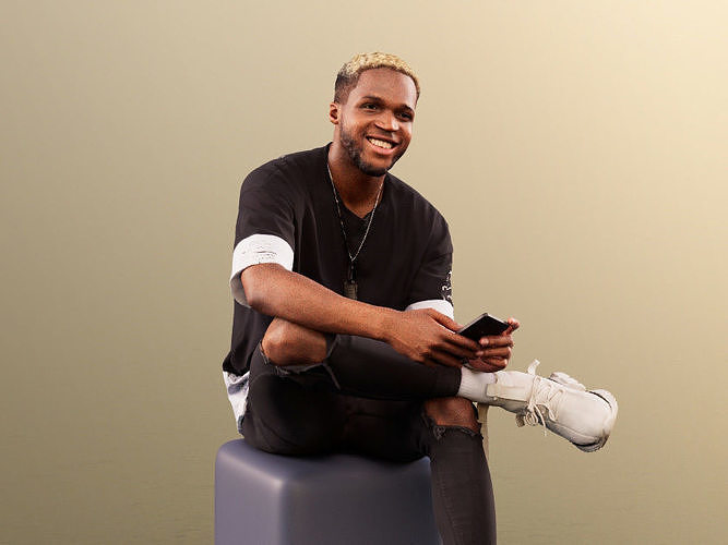 Maverick 12153 - Black Man Sitting With Smartphone And Laughing  Low-poly 3D model