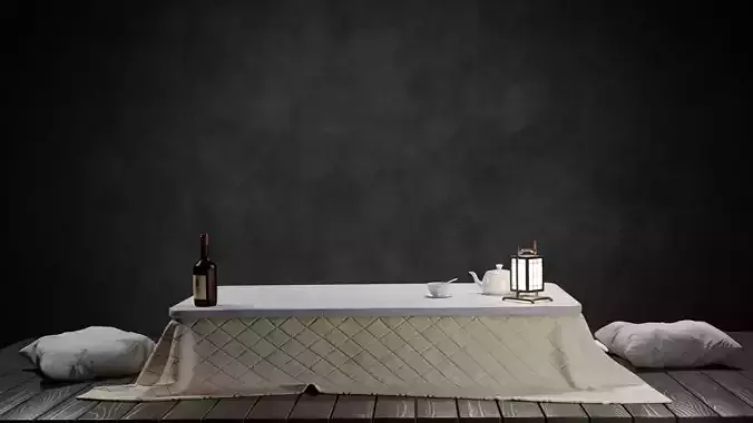 Kotatsu table with candles and bottle of wine