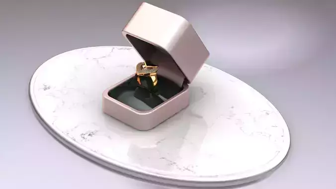 3d ring engagement in box on marble table