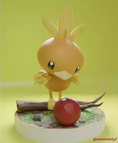 Torchic pokemon figurine on branch with ball