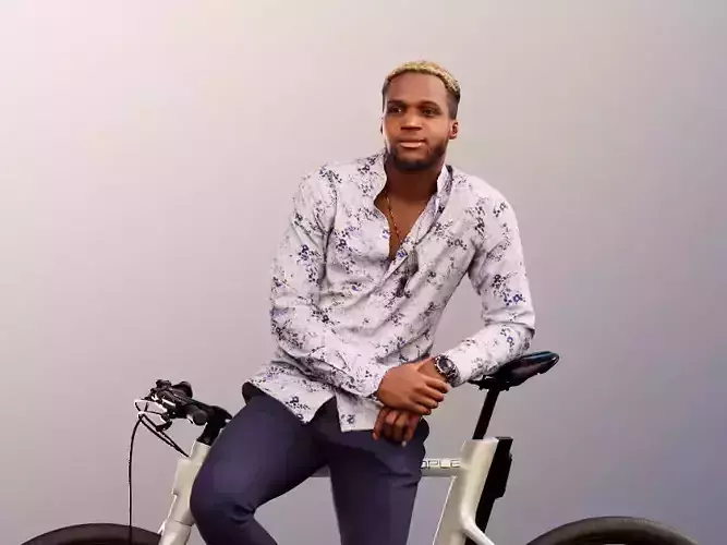 Maverick 12151 - Black Man Leaning On His Bike