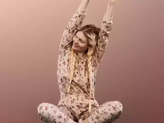 Kate 11864 - Woman In Pyjamas Sitting On Ground Stretching 