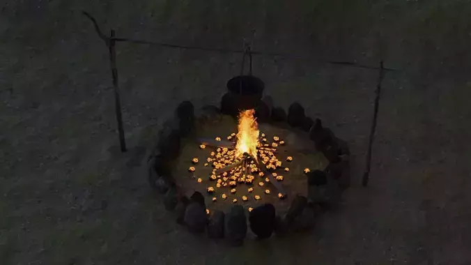 Bonfire with a rusty charred bowl