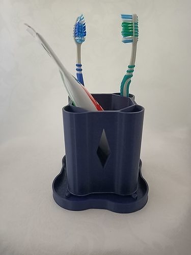 UNIQUE TOOTH BRUSH AND TOOTH PASTE HOLDER WITH DRIP TRAY 3D print model