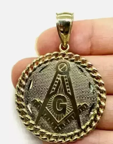 pendent gold pendant with masonic symbol