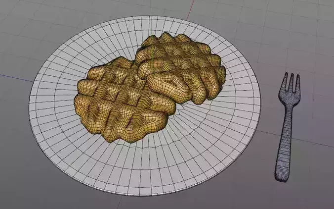 Waffle biscuit on plate with fork and knife