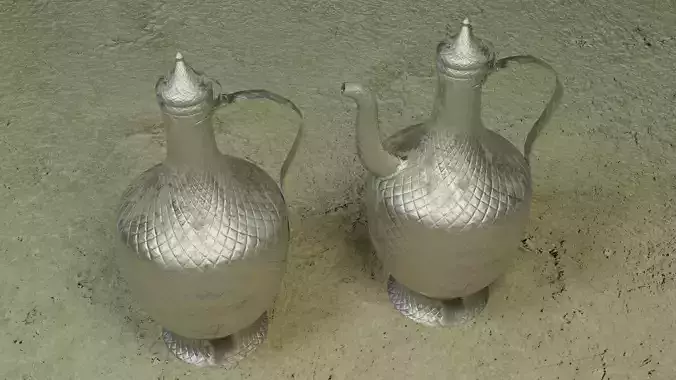 Pitcher pair of silver jugs