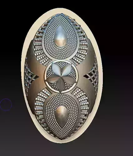 ring11 metal egg with ornate design