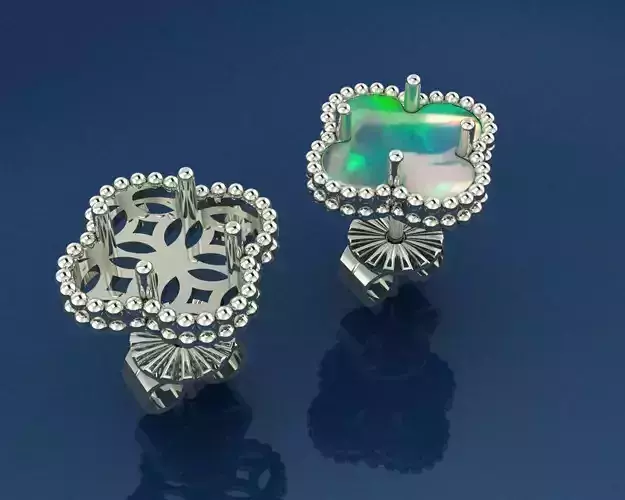 earrings pair of with opal in middle