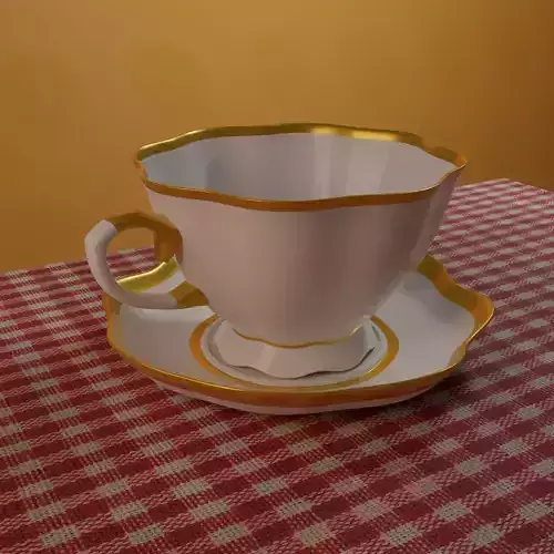 tea set cup and saucer on checkered tablecloth