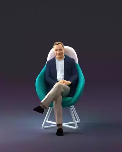 001058 man in suit seat in armchair