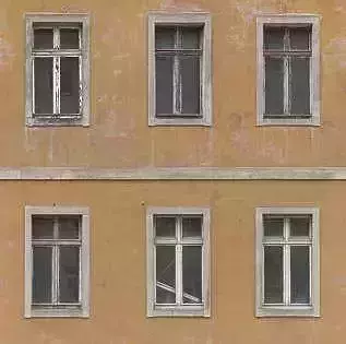 trtygetr windows of building in budapest