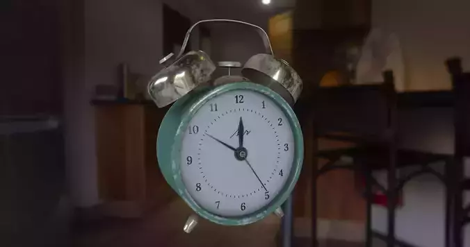 old  vintage round green alarm clock with gold rings