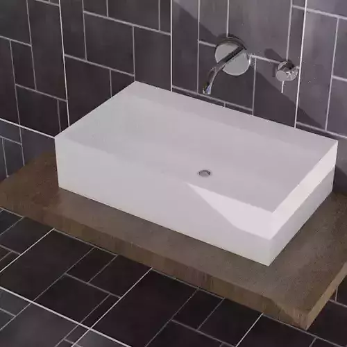 Washbasin bathroom sink on tiled wall