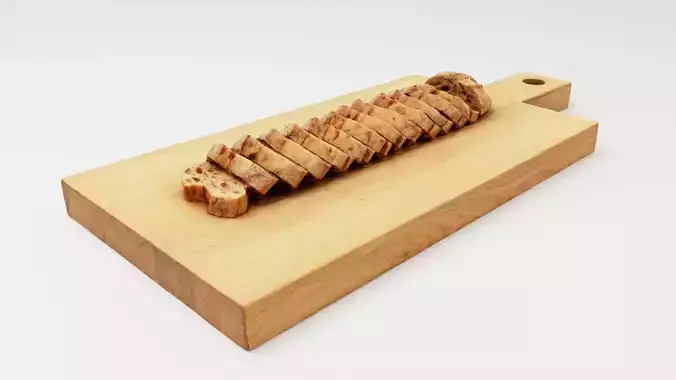 Slices of buckwheat roll or loaf on wooden chopping board