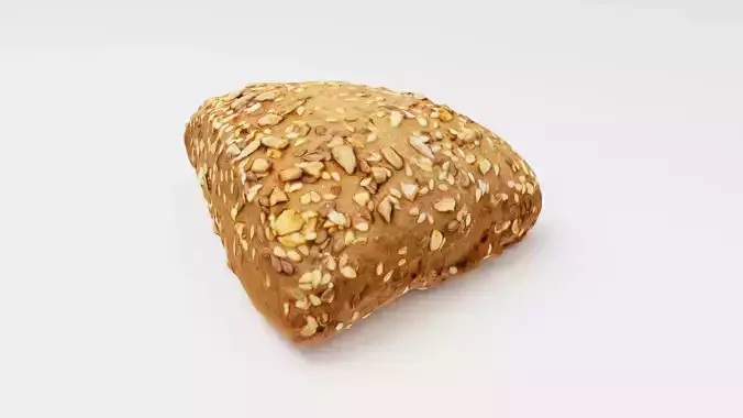 Dark bread bun or loaf with sesame and sunflower seeds