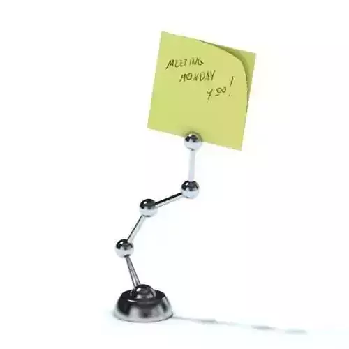 Chrome Paperweight With Yellow Post It