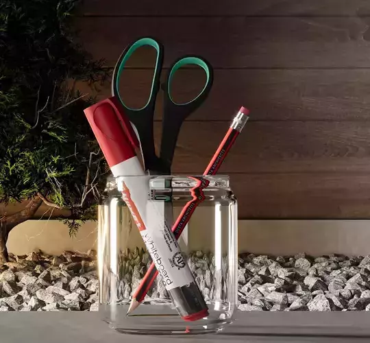Scissor Marker Pencil inside a glass holder