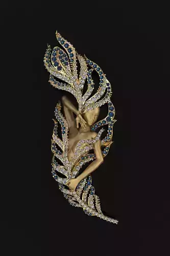 Magerit feather brooch with diamonds and sapphires