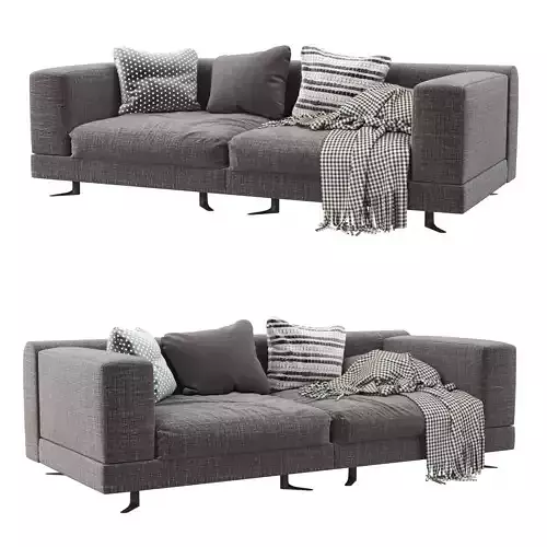 White sofa with pillows and blankets