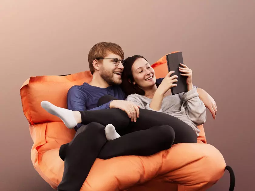 Silas And Noelle 12857 - Couple Sitting On Couch With Tablet Low-poly 3D model_0