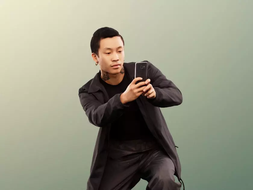 Henrik 12556 - Asian Man Taking Photo Low-poly 3D model_0