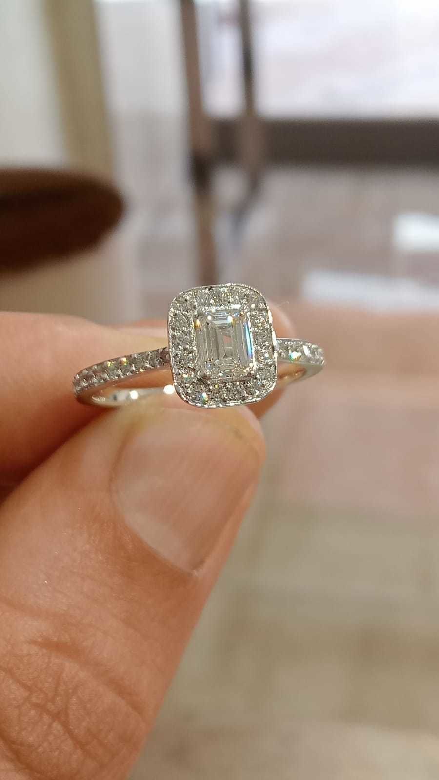 Solitaire with halo diamonds and emerald cut center stone 3D print model_19