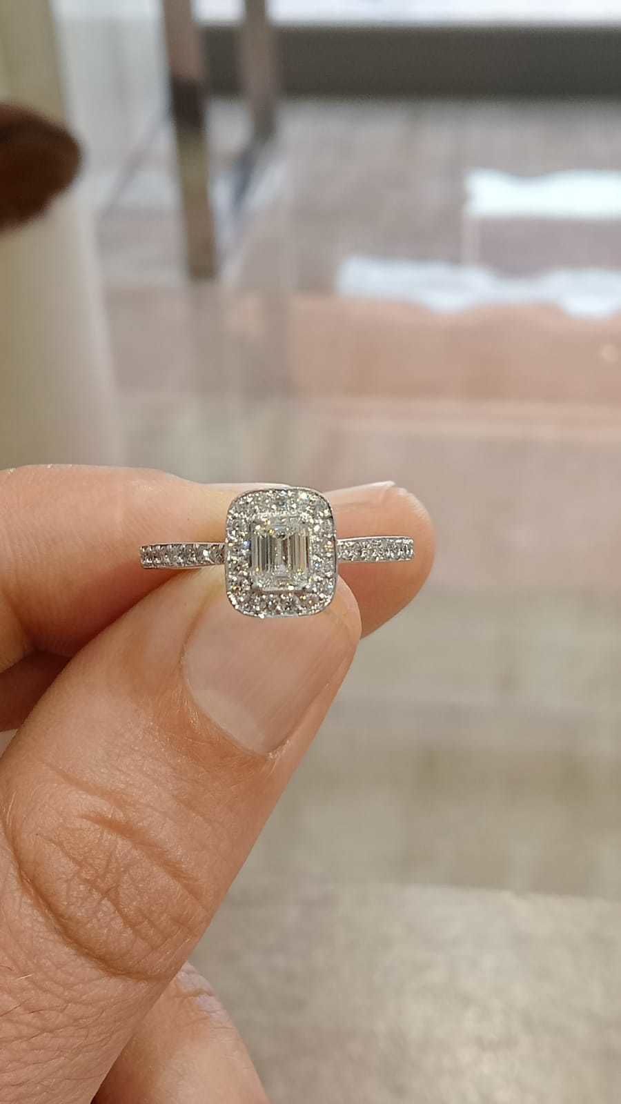 Solitaire with halo diamonds and emerald cut center stone 3D print model_18