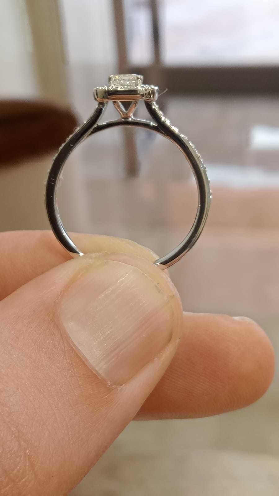 Solitaire with halo diamonds and emerald cut center stone 3D print model_17