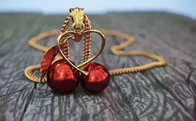 chery pendant made of cherries and leaves