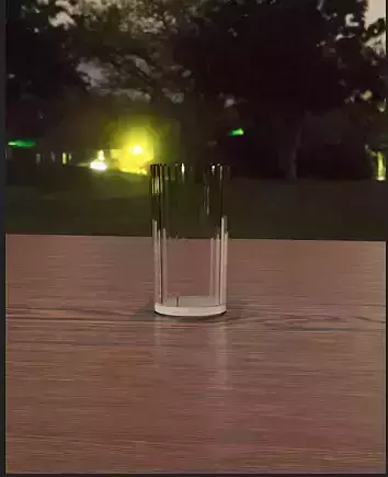 Glass model on table at night