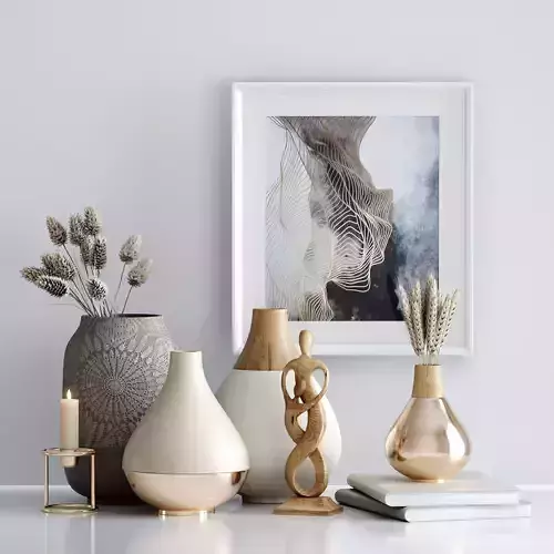 Decorative set vases and books on table