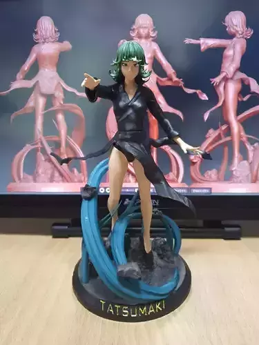 tatsumaki statue of woman holding sword