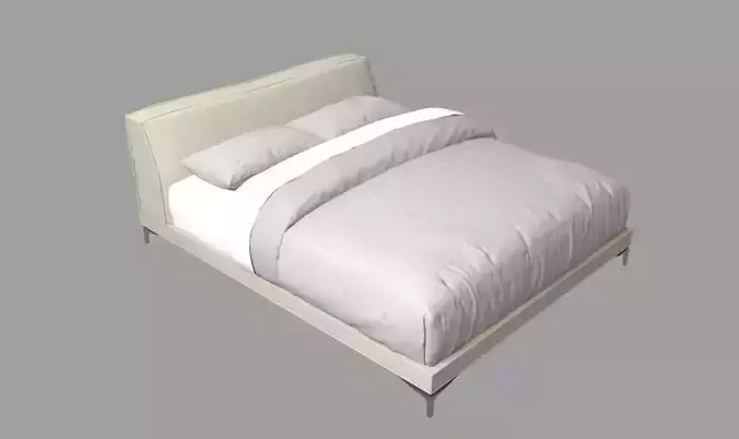 grey bed with linens 