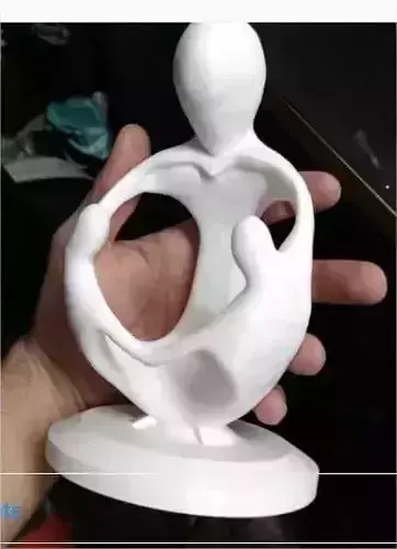 pendant person holding sculpture