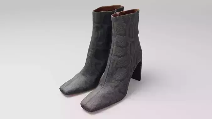 Pair of Python skin or leather brown womens boots shoes