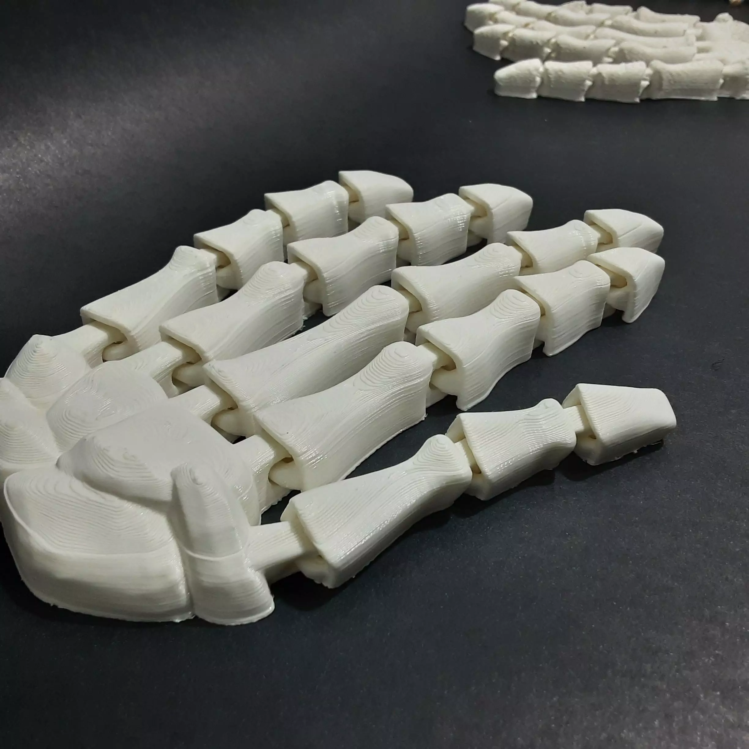 Skeleton hand flexible print-in-place no supports needed 3D print model_0