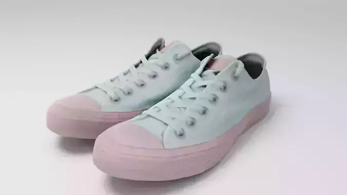 Pair of woman sneakers or gumshoes pink white urban footwear 