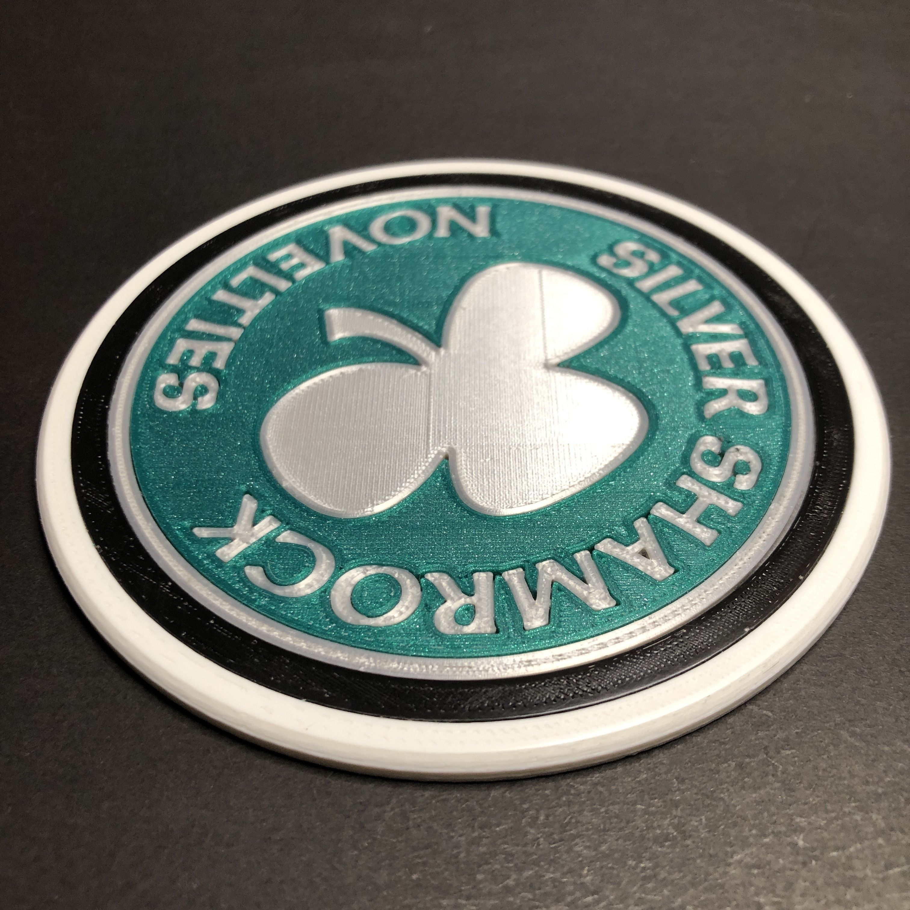 Silver Shamrock Novelties Logo Coaster 3D print model_2